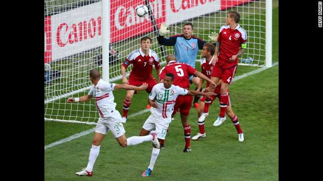 Pepe of Portugal, left, celebrates scores the team's first goal against Denmark.