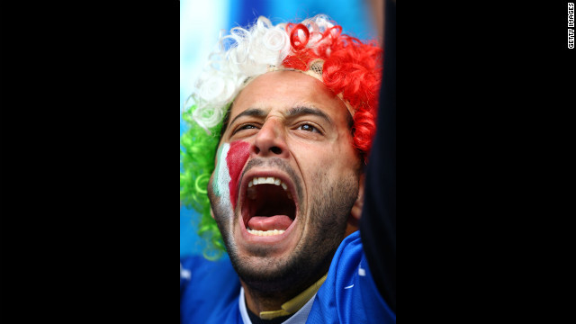An Italy fan cheers during the team's Group C match against Croatia.
