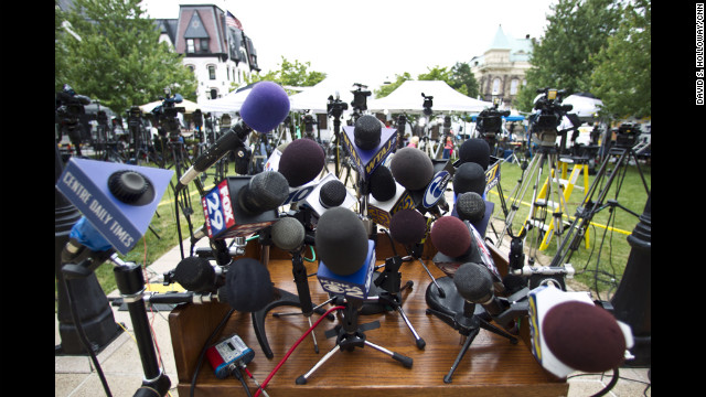 The podium stand outside of Jerry Sandusky's trial on its first day is covered in mics, hinting at the massive media coverage of the event.