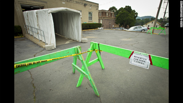 Several photographers and videographers staked out spots behind the police's green barriers in the back of the courthouse where Sandusky's trial was taking place. 