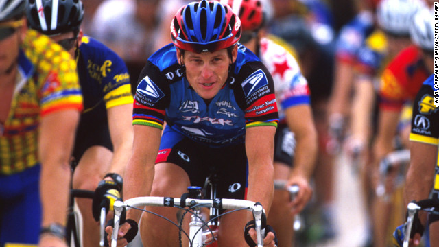 Armstrong rides for charity in May 1998 at the Ikon Ride for the Roses to benefit the Lance Armstrong Foundation. He established the foundation to benefit cancer research after being diagnosed with testicular cancer in 1996. After treatment, he was declared cancer-free in February 1997.