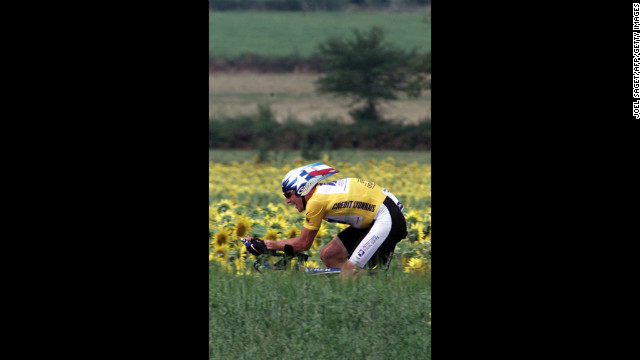 Armstrong rides during the 18th stage of the 2001 Tour de France. He won the tour that year for the third consecutive time.