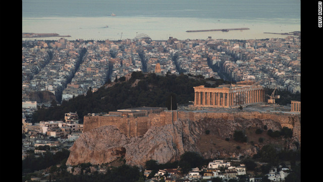 The Parthenon temple is seen on the skyline of Athens.