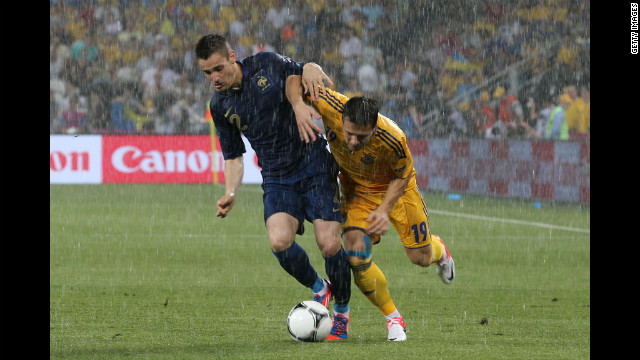 Ukraine's Yevhen Konoplyanka, right, battles France's Mathieu Debuchy for control of the ball Friday in a group D match.