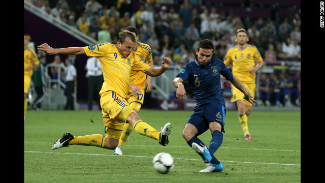 Yohan Cabaye of France scores the second goal past Oleh Husyev of Ukraine during the match between Ukraine and France.