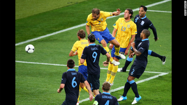 Olof Mellberg of Sweden scores Sweden's second goal against England in the Sweden-England matchup.