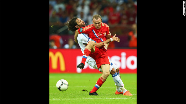 Aleksandr Anyukov of Russia and Georgios Samaras of Greece battle for the ball during the group A match between Greece and Russia on June 16. Euro 2012, bringing together 16 of Europe's best national football teams, began June 8 in Poland and Ukraine. See the action as it unfolds here.