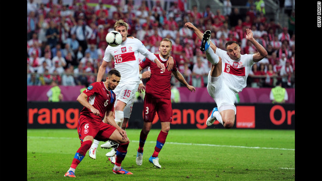 Dariusz Dudka of Poland goes in to win the ball during the match between Czech Republic and Poland.