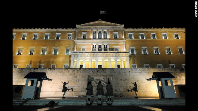 A night before the election, a changing of the guards takes place in front of the Greek parliament in central Athens on Saturday, June 16. 