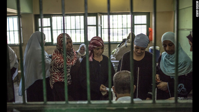 Women line up to vote at a polling station in Cairo, Egypt, on the second and final day of the run-off presidential election.