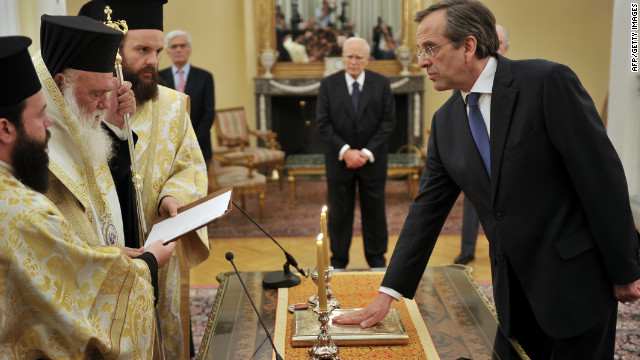 New Democracy leader Antonis Samaras is sworn in as Greece's new prime minister during a ceremony at the presidental palace in Athens on June 20, 2012.