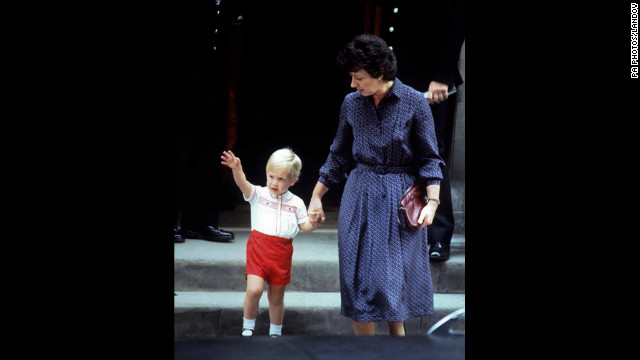 Accompanied by his nanny Barbara Barnes, Price William waves as he leaves St. Mary's Hospital after visiting his mother and his newborn brother, Prince Harry, on September 16, 1984.