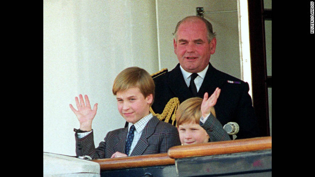 Prince William and Prince Harry wave from the deck of the Royal Yacht Britannia in 1991.