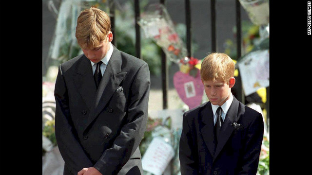 At age 15, Prince William and his brother Harry, 12, bow their heads after their mother's funeral at Westminster Abbey on September 6, 1997. Princess Diana died in a car crash in Paris that August.