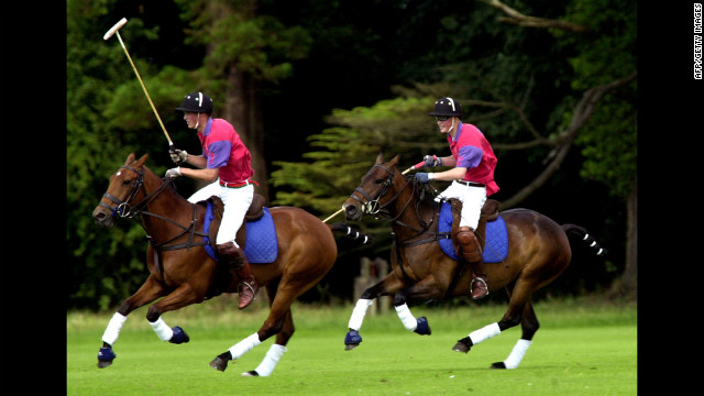 In 2001, Prince William, left, and Prince Harry take part in an exhibition polo match in Gloucestershire, England.