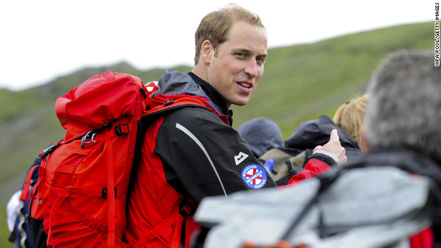 Prince William walks with a group of homeless people during a 2009 hike with Centrepoint, the United Kingdom's largest youth charity for the homeless. William became the patron of the organization in 2005.