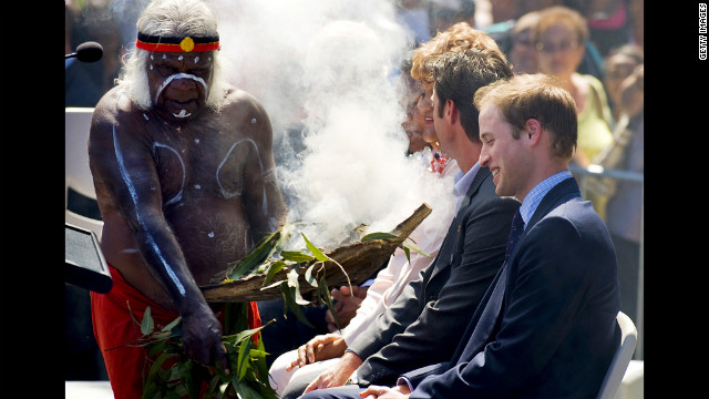 During his first official overseas visit, Prince William is welcomed to Sydney with a traditional smoke ceremony by local Aboriginal elder Uncle Max in 2010.