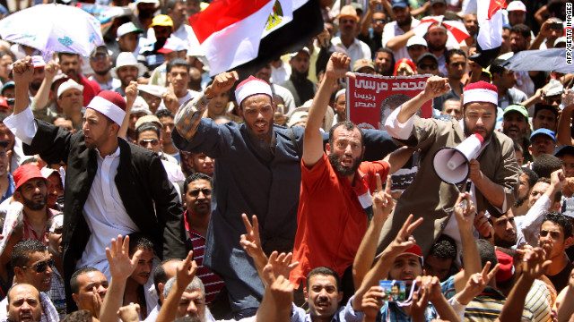 Muslim clerics join demonstrators in Cairo's Tahrir Square on Thursday to protest the delay of the presidential election results. The Presidential Election Commission postponed the release of the presidential election results, and both candidates have declared themselves winners.