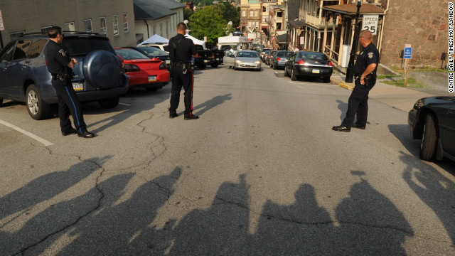 Shadows of the media are seen outside the courthouse during the second day of deliberations. Jurors took 21 hours over two days to convict Sandusky on 45 of 48 charges against him.