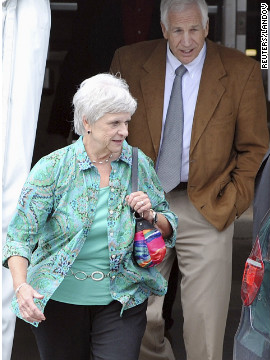 Dottie Sandusky, who has been married to Sandusky for 46 years, walks with her husband while jurors deliberate. She testified that she did not witness any sexual abuse.