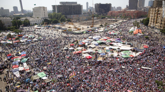 Egyptians fill Tahrir Square on Sunday, June 24, as they wait for the elections commission to announce the winner of the country's presidential election.