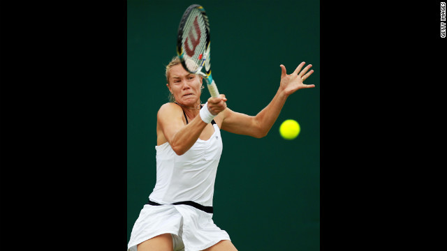 Nina Bratchikova of Russia returns with a forehand during her match against Alize Cornet of France on Wednesday.
