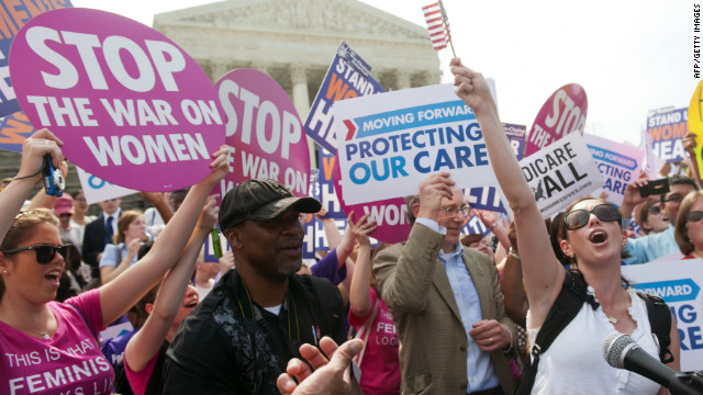 Supporters of the health care legislation celebrate after the Supreme Court upheld the constitutionality of the Patient Protection and Affordable Care Act in a 5-4 ruling Thursday, June 28. 
