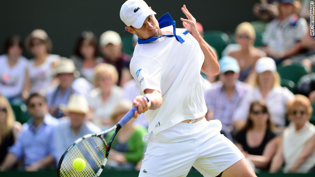 Andy Roddick of the United States plays a forehand shot during his second-round match against Bjorn Phau of Germany on June 28.