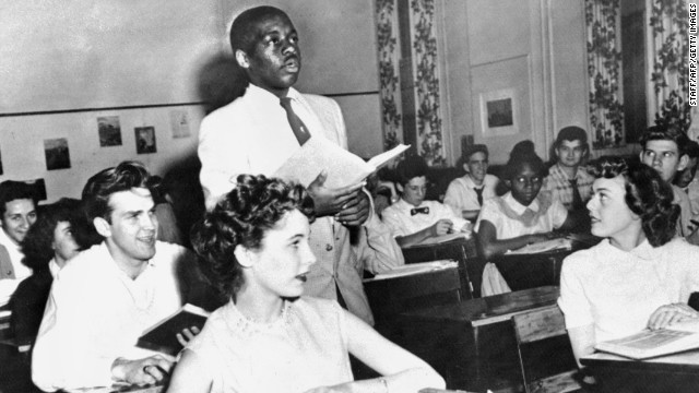 Brown v. Board of Education (1954): Nathaniel Steward recites his lesson surrounded by white classmates at the Saint-Dominique School in Washington. In Brown v. Board of Education, the Supreme Court ruled that it was unconstitutional to separate students based on race. 