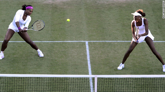 U.S. players Serena Williams, left, and Venus WIlliams in their first-round women's doubles match against Ukraine's Olga Savchuk and Serbia's Vesna Dolonc on June 28.