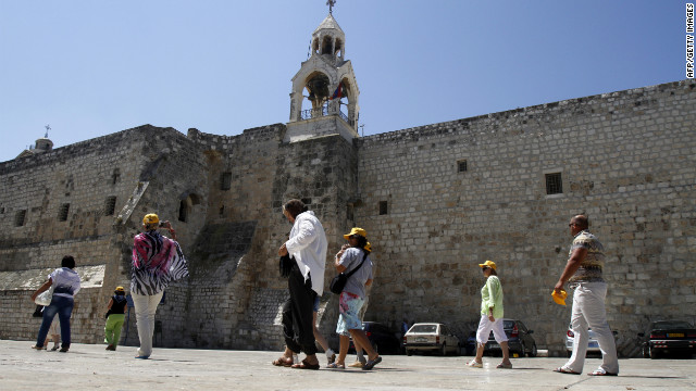 Christian pilgrims visit the Church of Nativity in the Palestinian city of Bethlehem on June 28, 2012. 