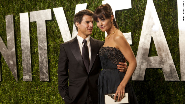 Katie Holmes and Tom Cruise arrive at the Vanity Fair Oscar Party in February