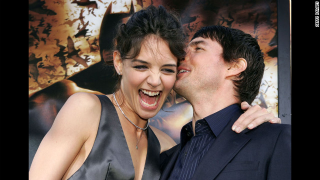 Holmes and Cruise cuddle up on the red carpet for the "Batman Begins" premiere at Grauman's Chinese Theater in Hollywood in 2005.