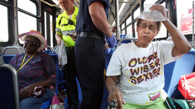 Linda Gordon, right, finds relief from the extreme heat with an ice pack in Memphis, Tennessee, on Saturday, June 30.