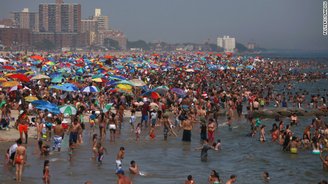 Residents crowd onto the beach at Coney Island in Brooklyn, New York, in the powerful heat on Saturday.