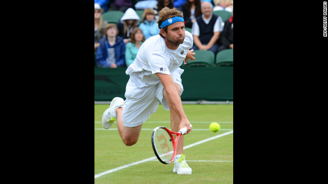 Mardy Fish of USA plays a forehand shot against Jo-Wilfried Tsonga on Monday.