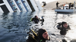 Italian coast guard divers search near the Concordia on January 21. 