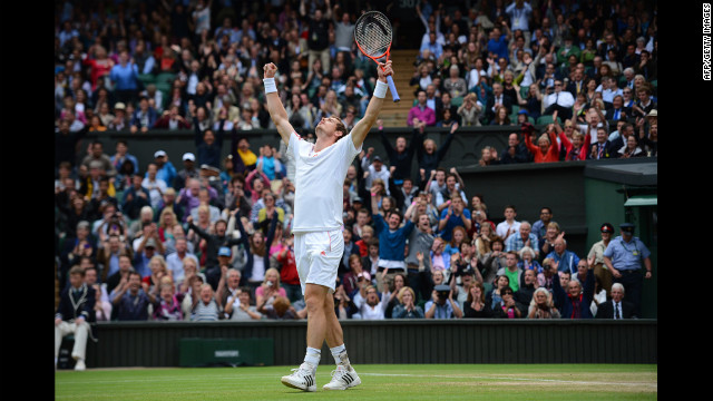 Britain's Andy Murray celebrates his men's singles quarter-final victory over Spain's David Ferrer on Day Nine of the Wimbledon Lawn Tennis Championships at the All England Lawn Tennis and Croquet Club on Wednesday in London, England. 