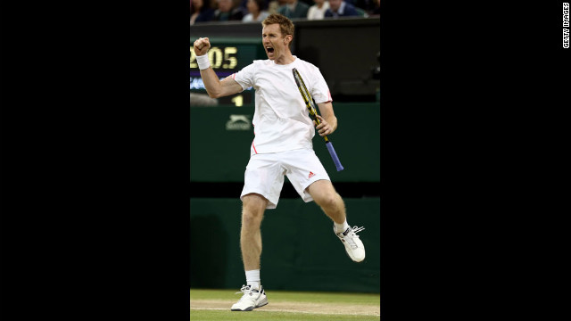 Britain's Jonathan Marray celebrates a point during the men's doubles final match at Wimbledon on Saturday, July 7. Marray was teamed with Denmark's Frederik Nielsen against Romania's Horia Tecau and Sweden's Robert Lindstedt.