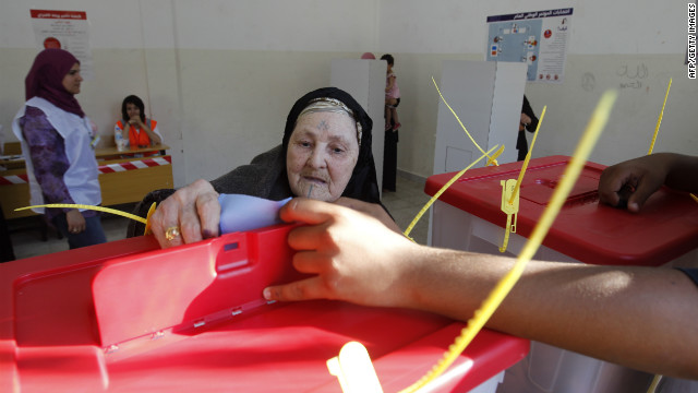 A Libyan woman casts her ballot at a Benghazi polling station.