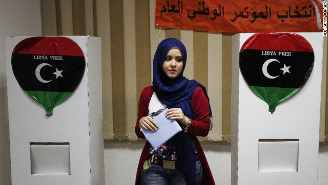 A woman prepares to cast her ballot at a Tripoli polling station.