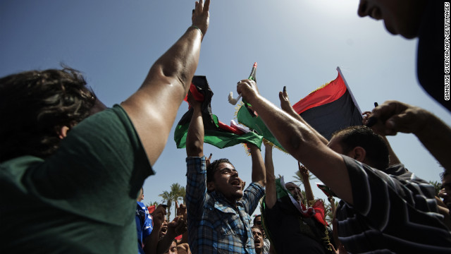 Libyans celebrate in Tripoli's Martyrs' Square after voting for the Libyan General National Assembly.