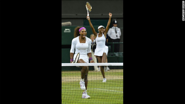 Sisters Serena and Venus Williams of the United States celebrate following their win against Czech Republic's Andrea Hlavackova and Lucie Hradecka in the women's doubles final on Saturday.