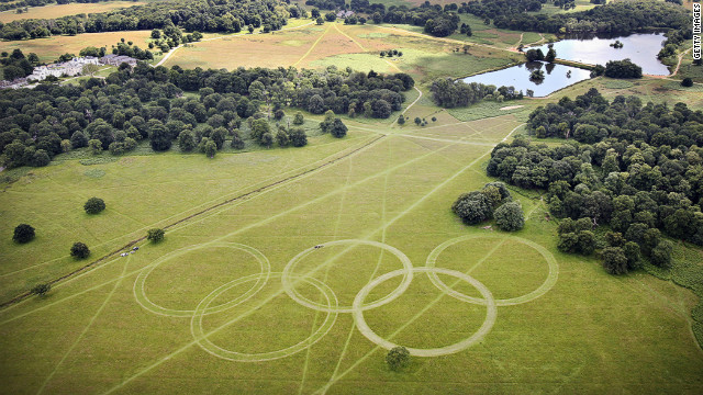 With just days to go until the opening ceremony, organizers have cut Olympic rings into the grass in Richmond Park, south-west London, further promoting the green ambitions of the Games. David Stubbs, head of sustainability for London 2012 said: "If you can put sustainability at the heart of a project which is the largest logistical exercise in peace time ... then you can do it anywhere."<br/><br/> 