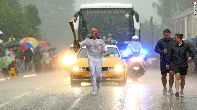 The Olympic torch has been on a tour of the UK since May 19 and while there have been many days filled with sunshine, others, like this one near Mansfield, have proved a threat to the flame itself.