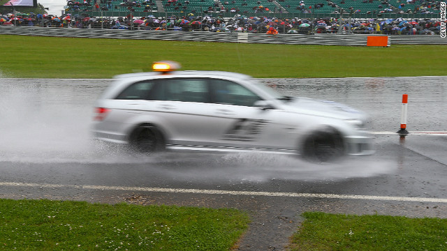 Formula One's British Grand Prix eventually began under clear skies but heavy rain prior to the race forced organizers to ask those with cars not to attend Saturday's qualifying session after camping areas and car parks became waterlogged.