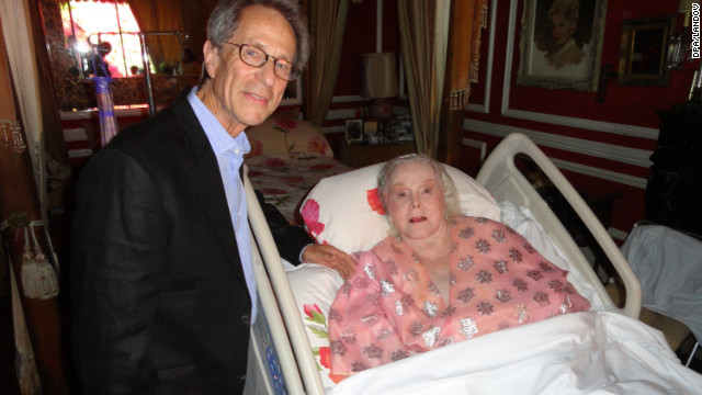 Judge Charles Rubin congratulates Zsa Zsa Gabor for her silver wedding anniversary at her house in Los Angeles in 2011. 