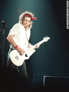 Guitarist Keith Richards performs at the Aragone Ballroom in Chicago, Illinois, in 1987. The songwriter collaborated with Mick Jagger on their first international number 1 hit "(I can't get no) Satisfaction" in 1965.