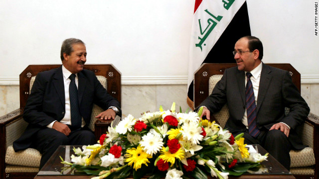 A photo dated November 4, 2010 shows Syria's ambassador to Iraq, Nawaf al-Fares (L) wihth Iraqi Prime Minister Nuri al-Maliki.