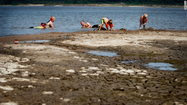 Swimmers relax in the shallow waters of the Mississippi River at Meeman-Shelby Forest State Park in Tennessee on July 6. Drought conditions have lowered the river's levels considerably from this time last year. 